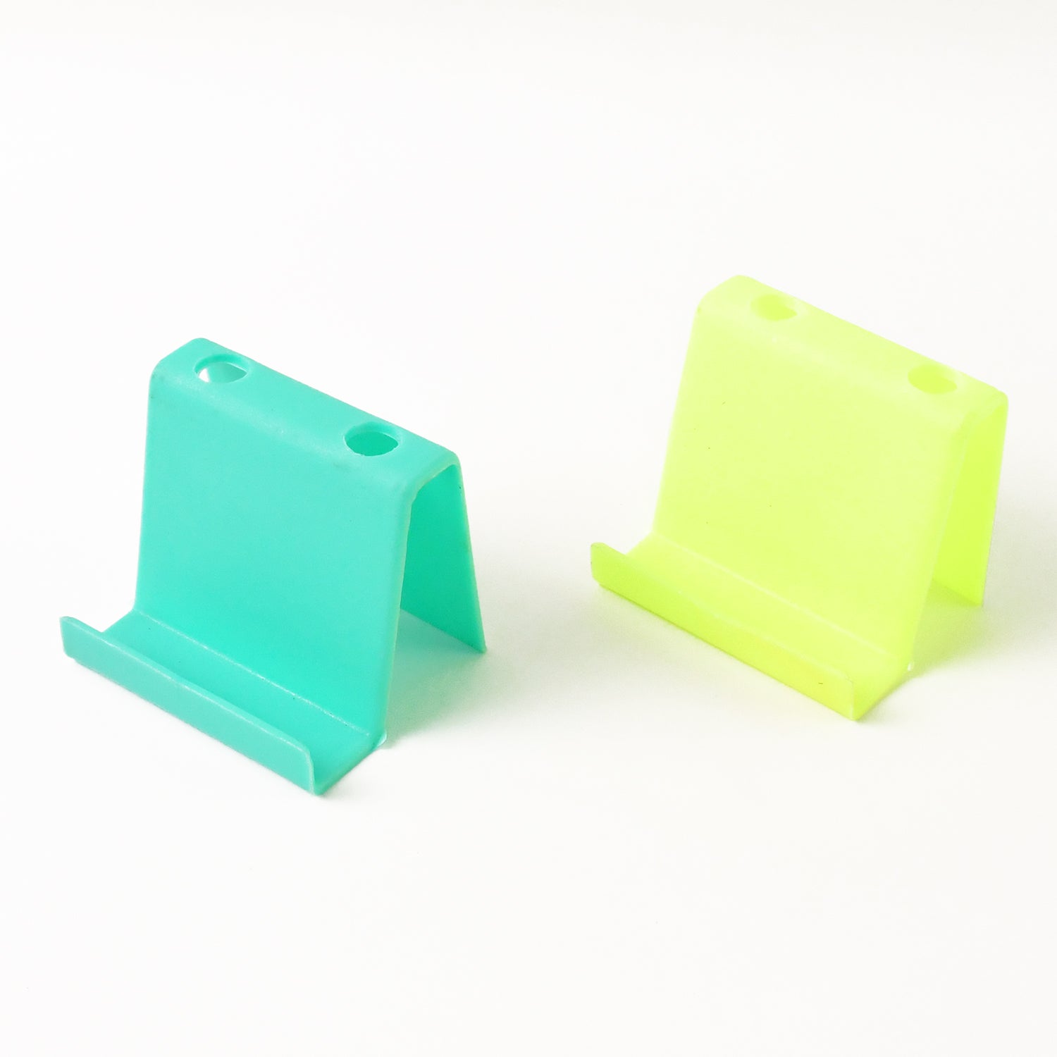 Multifunctional Plastic Mobile Phone Stand  Pen Holder (2 Pc  Mix Color) Multifunctional Plastic Mobile Phone Stand  Pen Holder (2 Pc  Mix Color)